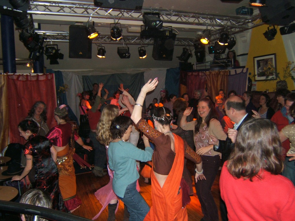 A Collaborative event involving bellydance troup Akasha, Acapellabella Community Choir and Mossy Bunyip and then Candyfloss Footpump!